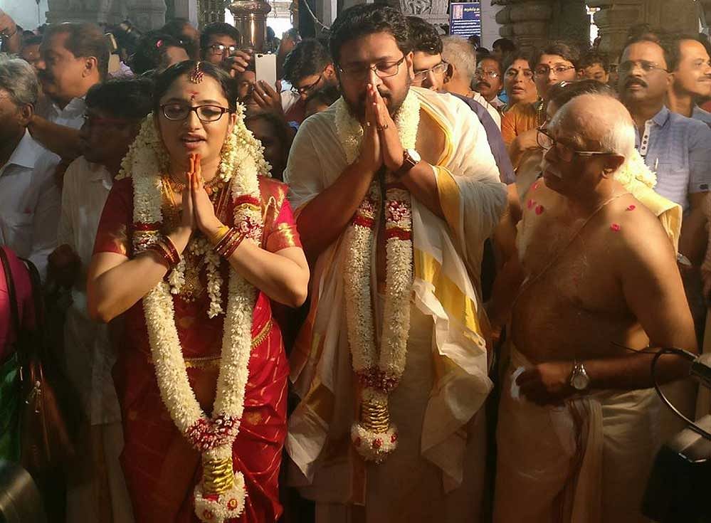 The marriage between Sabarinathan, an engineering graduate and Sub-Collector Divya, a medical doctor, has hit headlines since its announcement as a politician-bureaucrat wedding is considered a first in the state. Image courtesy: Facebook
