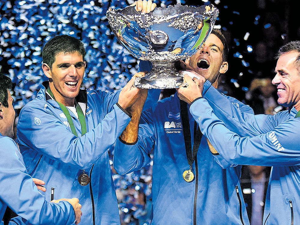TRANSFORMATION: The Argentine team with the Davis Cup last year. The combined finals of Davis Cup and Fed Cup is set to be held in Geneva this year.AFP