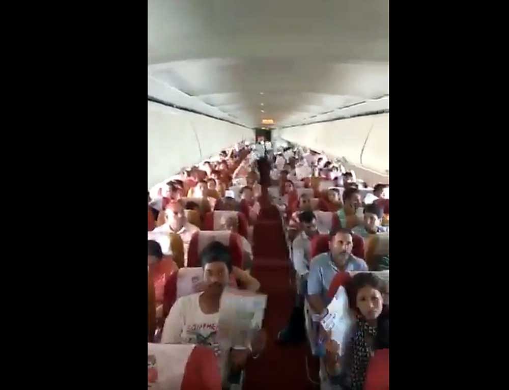 An Air India spokesperson said the passengers complained of malfunctioning of the air conditioning system in the flight and they also protested.