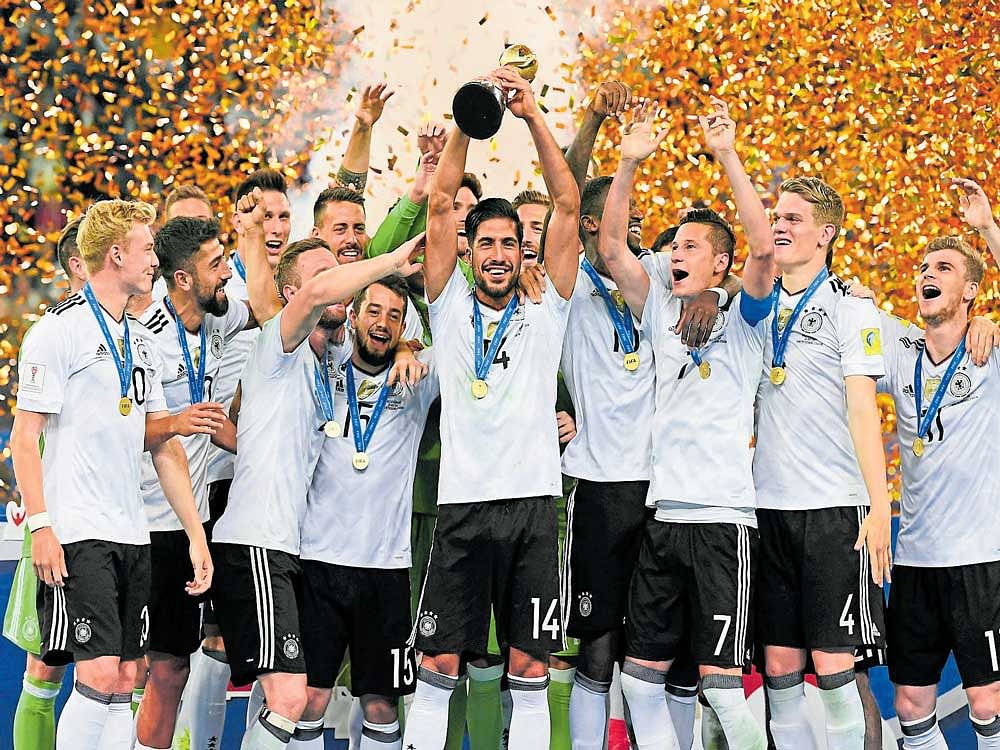 The German football team with the Confederations Cup after beating Chile 1-0 in the final at St Petersburg on Sunday. AFP