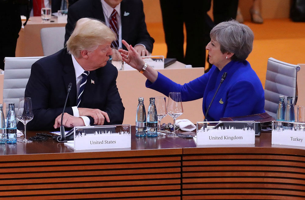 Theresa May said that the G20 leaders will attempt to get Donal Trump to rejoin the Climate accords. Photo credit: reuters.