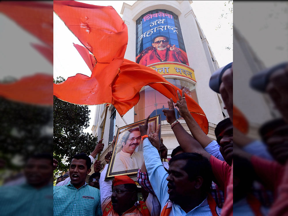 The Shiv Sena, incensed by blatant pro-Narendra Modi slogans at a BMC function, hit out, saying that his 'bhakts' would call his fall, just like how Indira's bhakts caused hers. PTI file photo.
