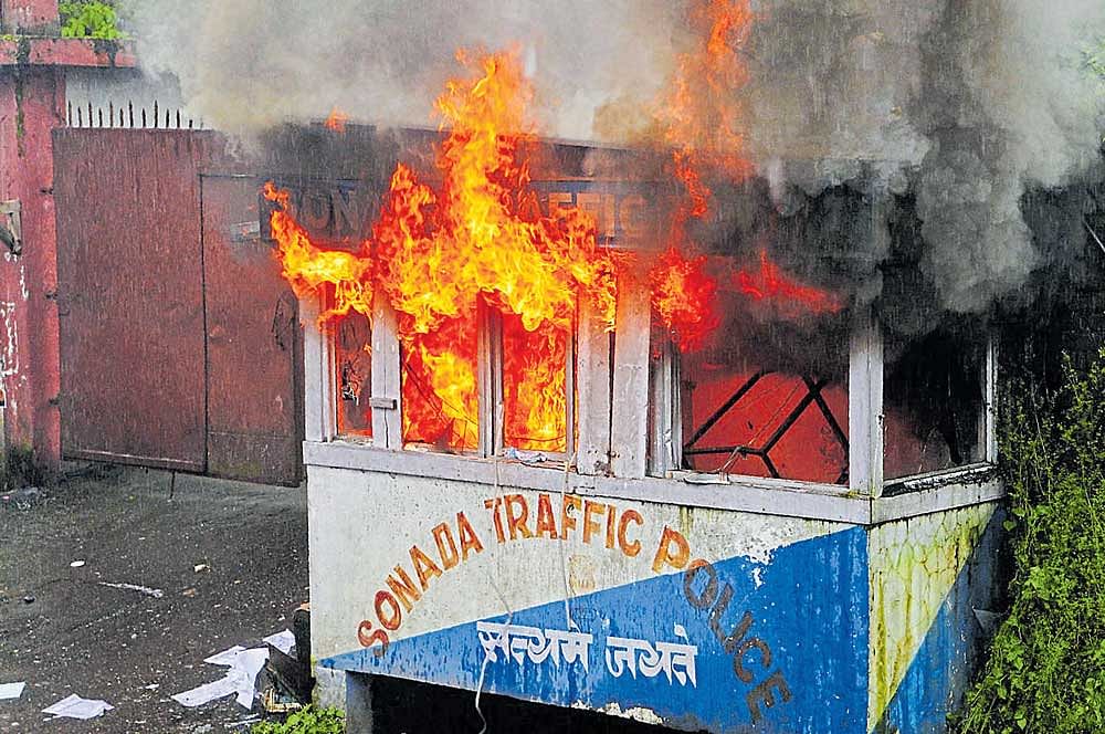 A police outpost set ablaze by Gorkhaland supporters  in Sonada near Darjeeling on Saturday. AFP