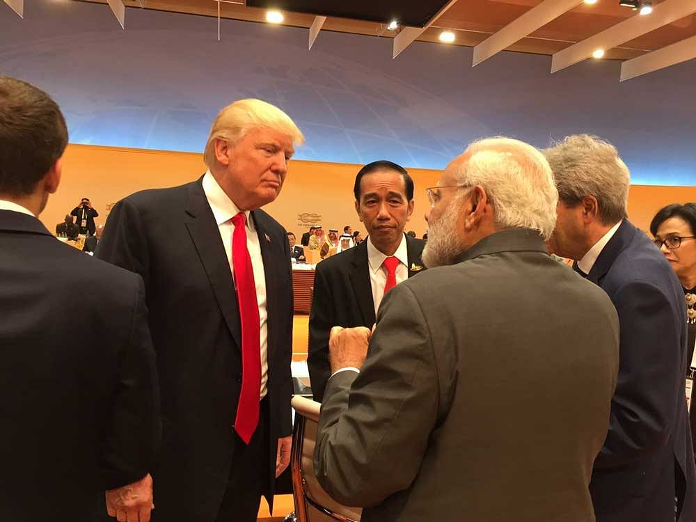 Arvind Panagariya, sherpa for India at the Summit, tweeted about the 'interaction', along with pictures of the two leaders and others just before start of the second day of working sessions of the G20 Summit ending today.