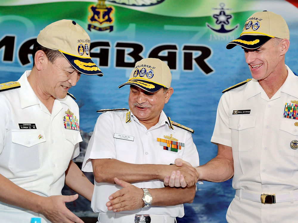 Flag Officer Commanding-in-Chief, Eastern Naval Command HCS Bisht (C), Japan Maritime Self-Defense Force Vice Admiral Hiroshi Yamamura (L), US Navy Commander Rear Admiral William D Byrne Jr (R), at the inauguration of three Nation 'Malabar Exercise 2017' which began in Chennai on Monday. PTI photo.