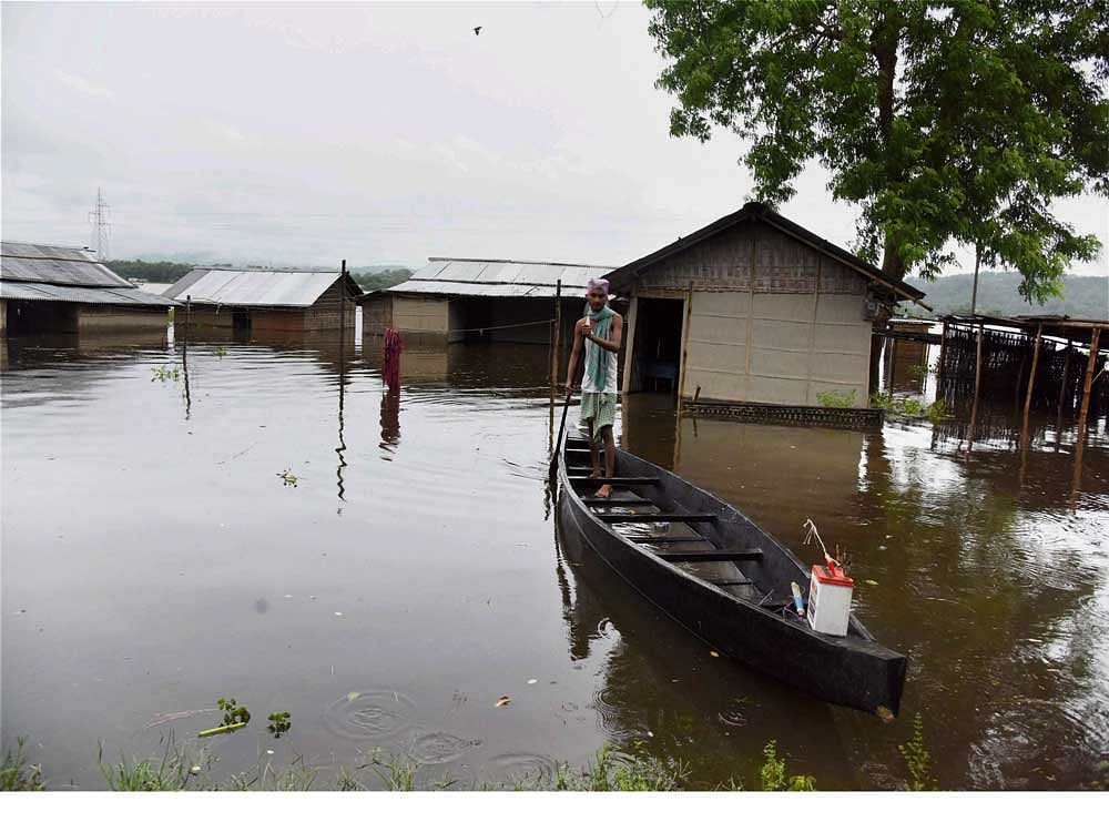 The flood situation in Assam turned critical with seven people losing their lives in a day today, affecting over 12.55 lakh people across 20 districts in the state. AP, PTI Photo