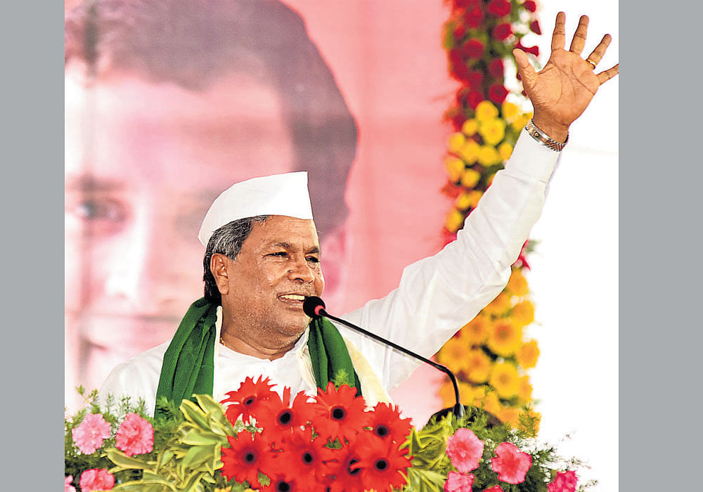 Chief Minister Siddaramaiah addresses a Congress workers' convention in Kalaburagi on Tuesday. dh photo