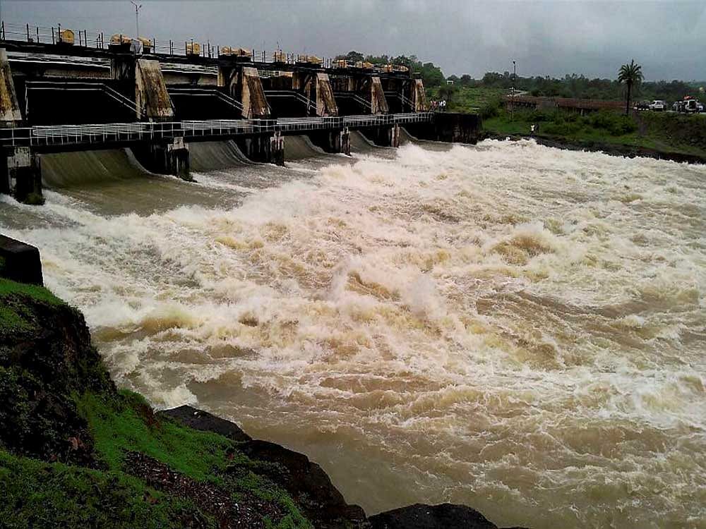 Water gushing out from the Darna Dam after its gates were opened on Friday in Nashik district following incessant rains. PTI Photo