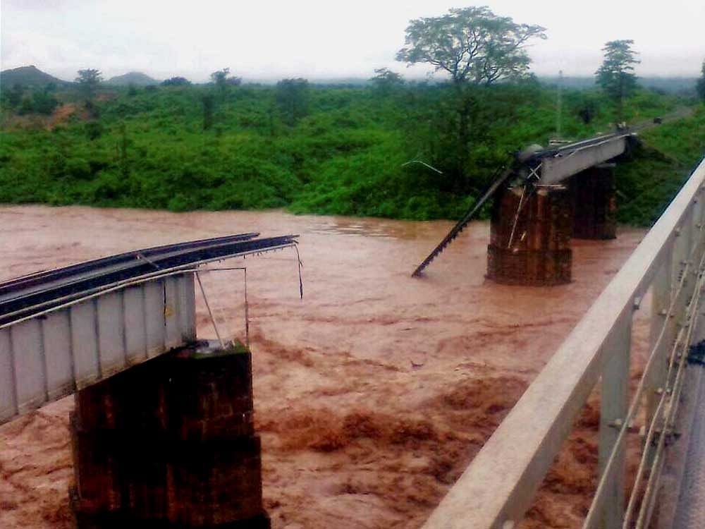Heavy rains swelled two major rivers causing flash floods in Odisha's Rayagada district, prompting the state government to seek the help of defence forces. AP, PTI Photo