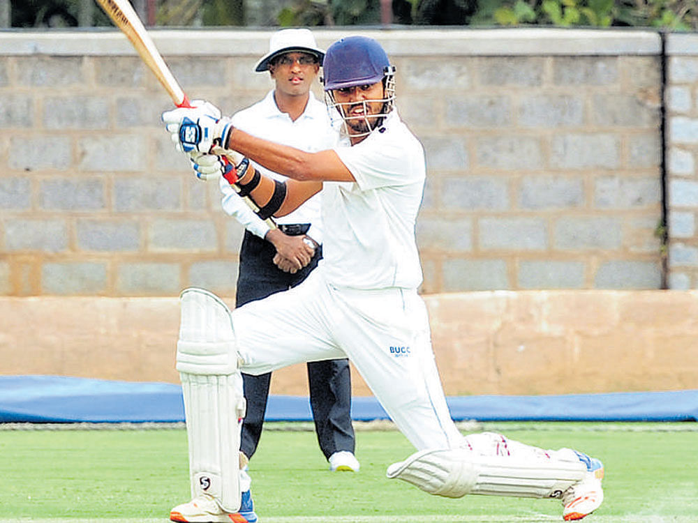 Flowing: Vice-President's XI's Shivam Mishra en route to his 144 against Combined XI at Alur ground on Sunday. AFP