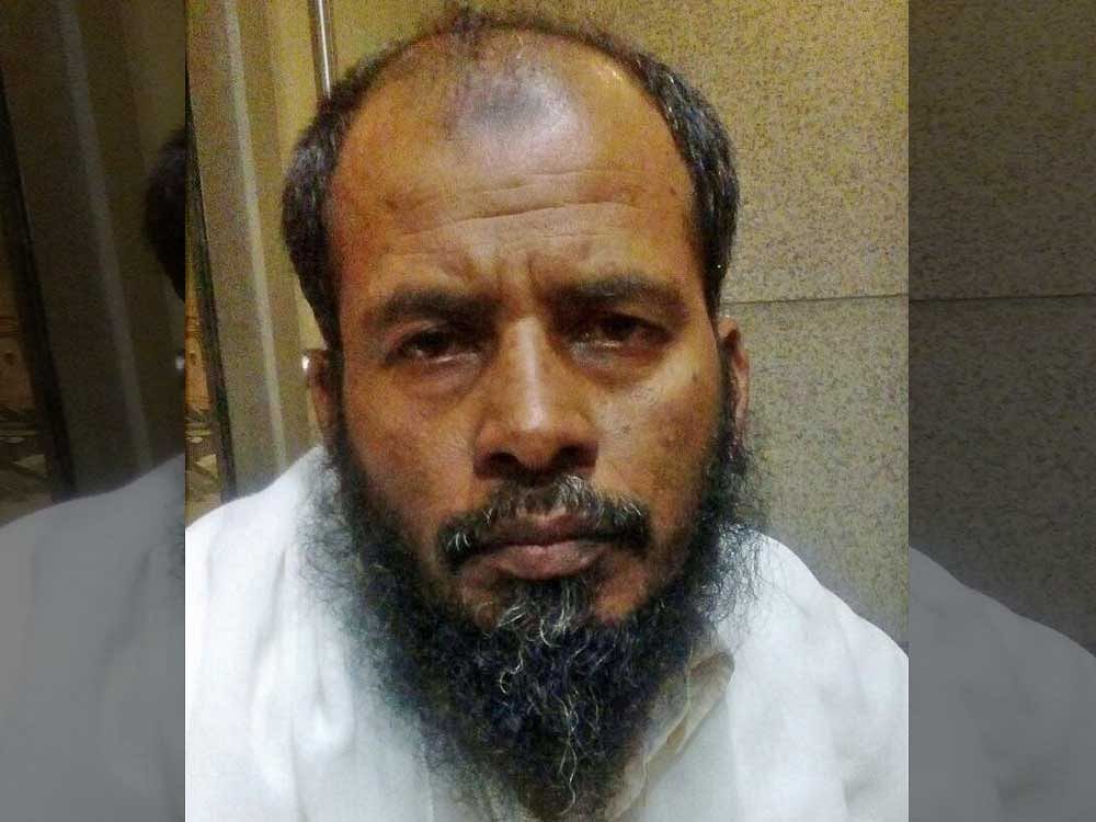 The suspect, Salim Khan, a resident of Faizabad in Uttar Pradesh, was arrested at the Chhatrapati Shivaji International Airport in Mumbai after he arrived here from the United Arab Emirates.