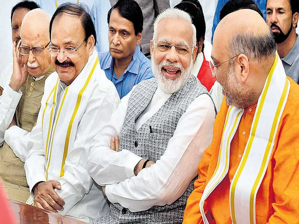 NDA's vice presidential candidate Venkaiah Naidu , along with Prime Minister Narendra Modi, BJP president Amit Shah, senior leader LKAdvani and other leaders, files his nomination papers at Parliament in New Delhi on Tuesday. PTI