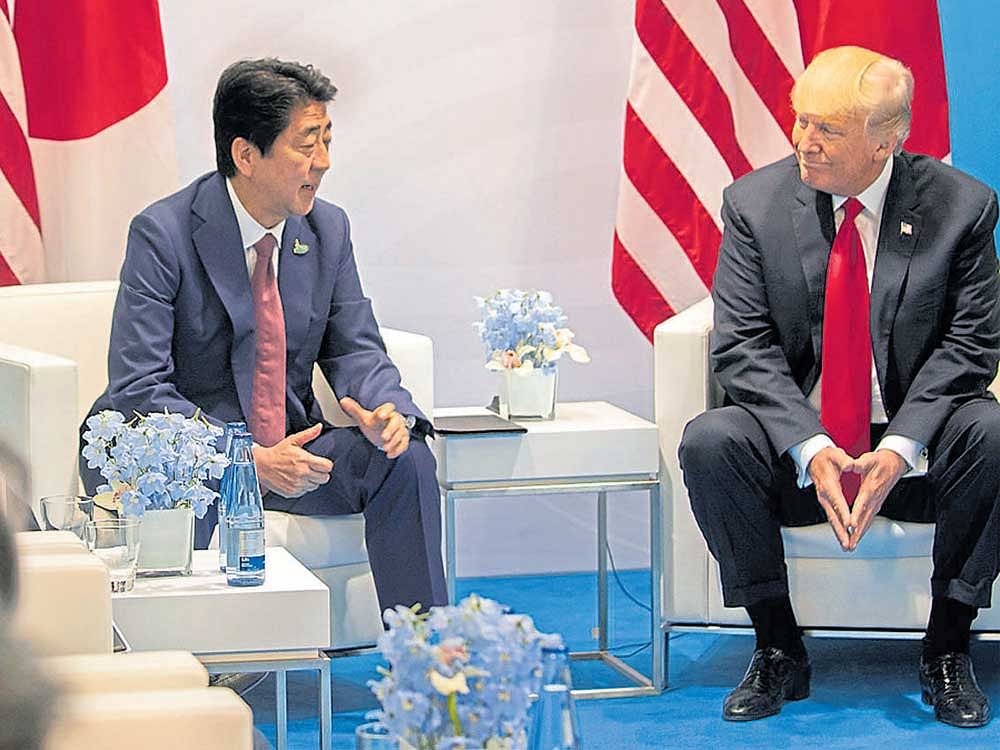 US President Donald Trump and Prime Minister Shinzo Abe of Japan at the G20 summit. Japan's effort to salvage the Trans-Pacific Partnership reflects a recognition that countries that previously counted on US leadership will have to forge ahead on their own. NYT File Photo
