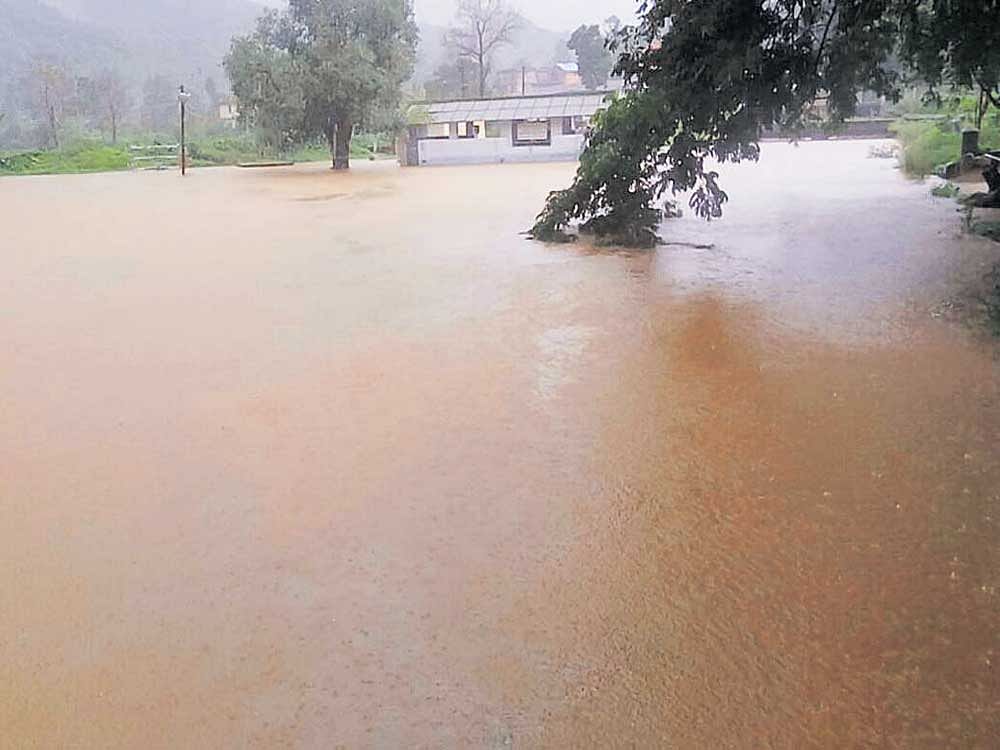 Bhagamandala in Kodagu district is inundated due to continuous rain on Wednesday. DH Photo