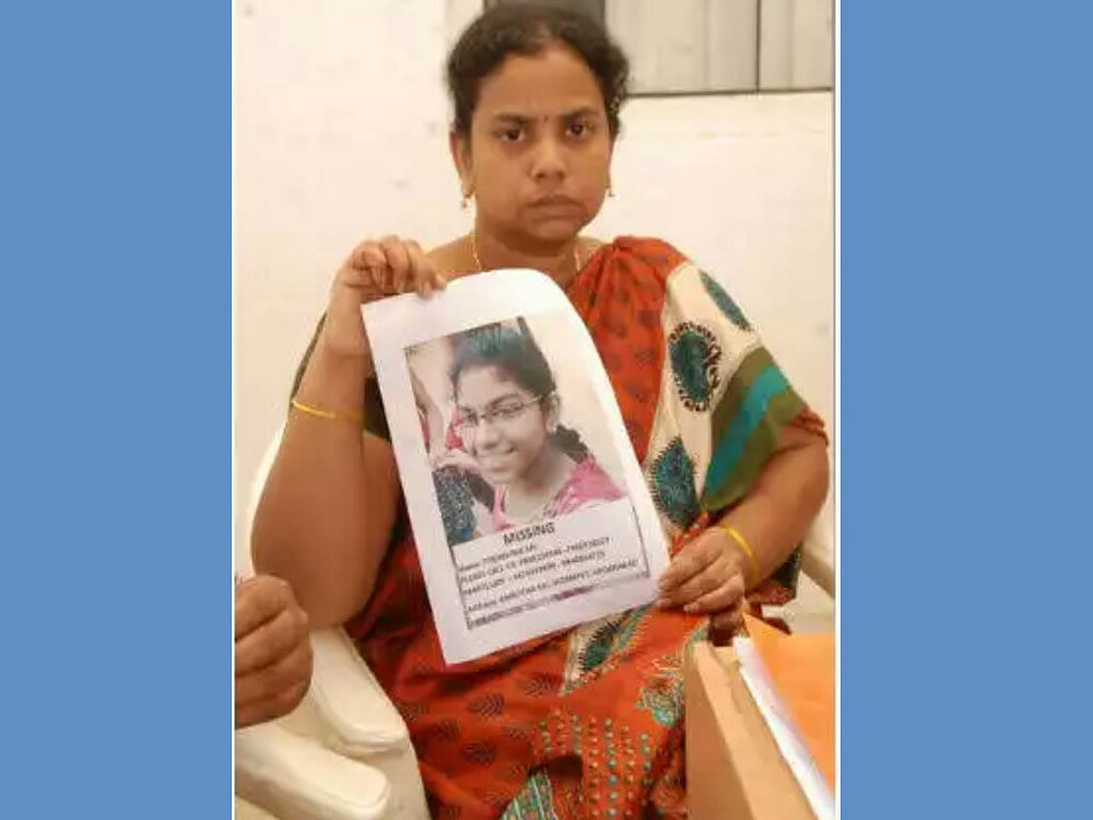 Poornima Sai's mother Vijayadevi with her photo