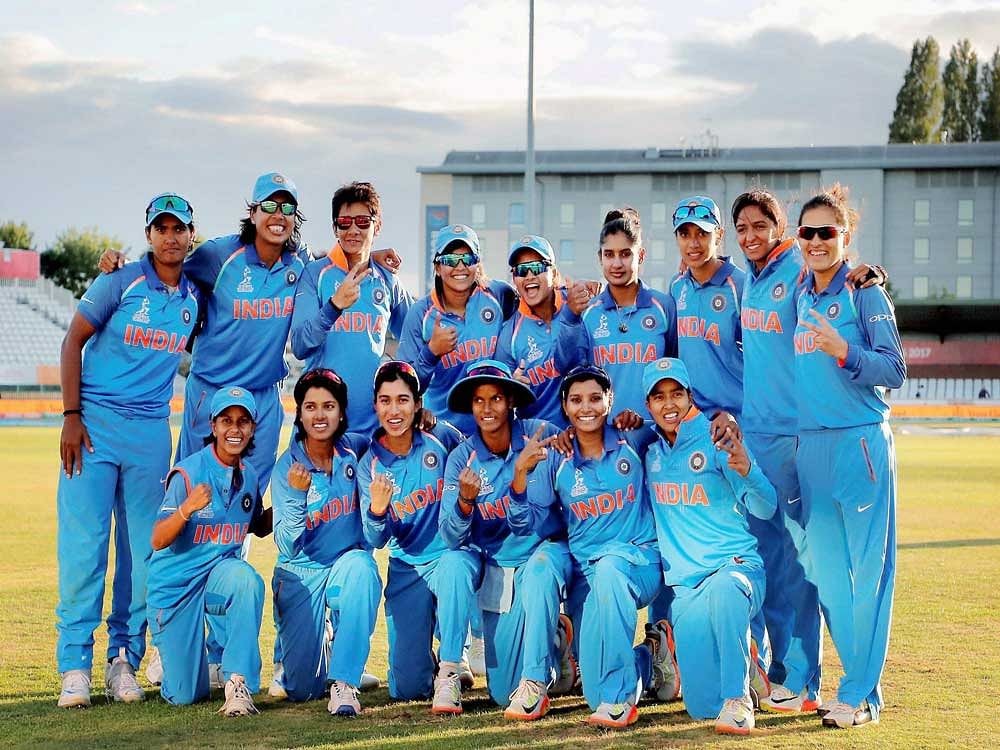 Indian women's cricket team celebrates after defeating Australia in the ICC Women's World Cup semifinal match in Derby, UK on Thursday. PTI Photo