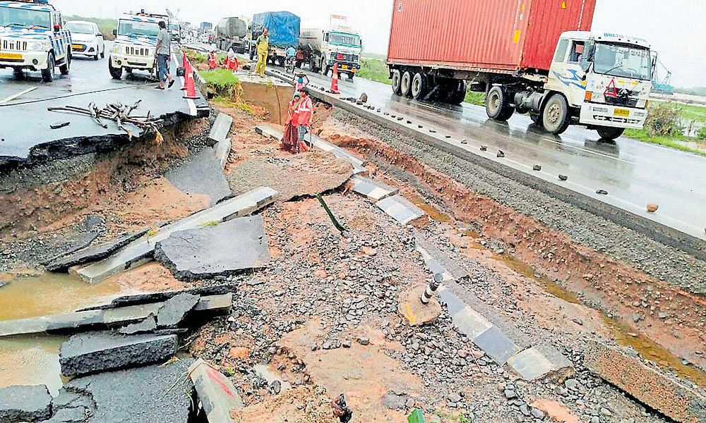 total destruction The Maliya-Miyana highway that was washed away following a heavy downpour in Morbi district of Gujarat on Sunday. PTI