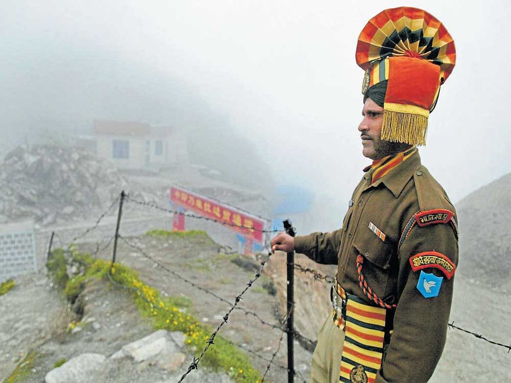 standing guard: China insists Indian troops invaded Doklam to help Bhutan, and it was a violation of international law. Some analysts say India made a mistake by openly conflating the building of the road with talk of potential