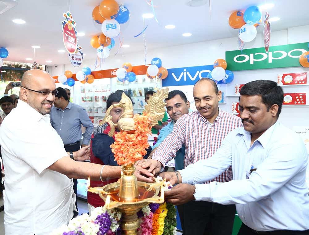 Pai International Electronics MD Rajkumar Pai (left) at the launch of the new store at Kengeri in Bengaluru on Saturday.