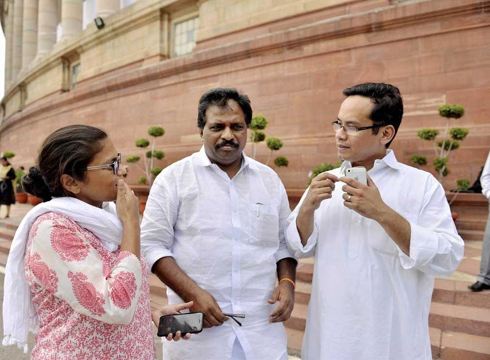 Sushmita Dev, K Suresh and Gaurav Gogoi seen after they were suspended by the Speaker during the monsoon session of Parliament in New Delhi on Monday. PTI