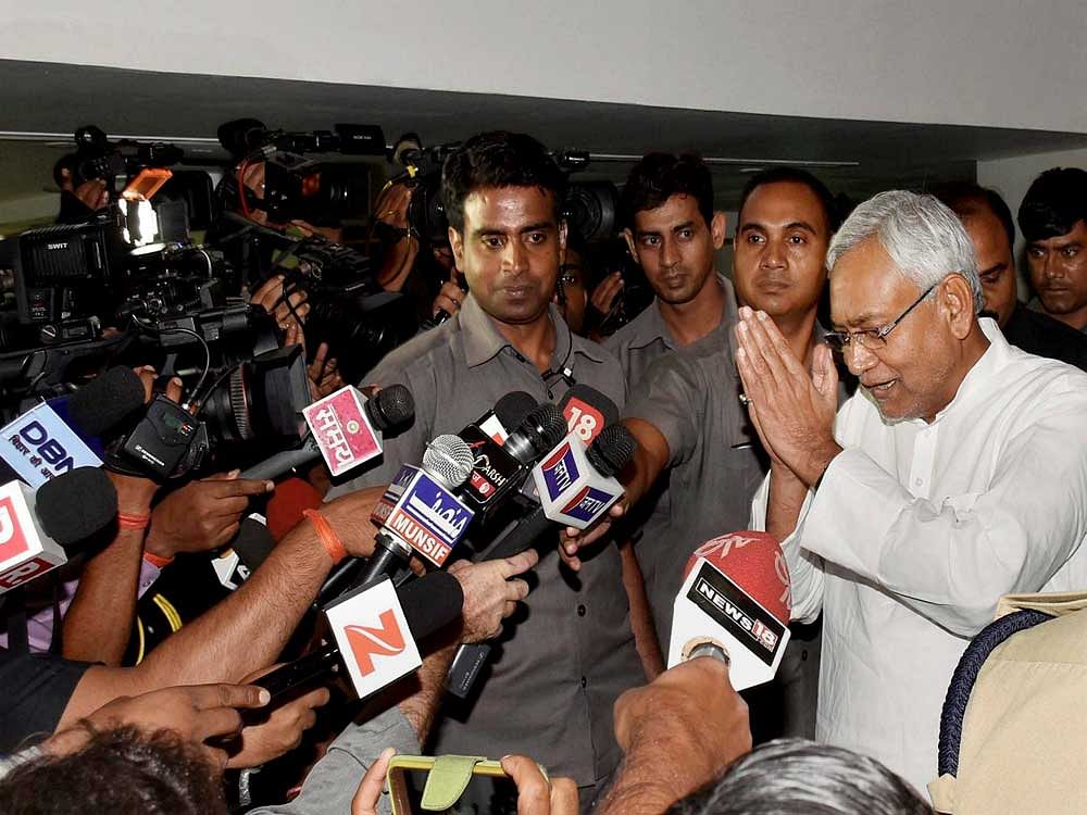 Nitish Kumar met Bihar Governor Keshari Nath Tripathi this evening to deliver his resignation. PTI File Photo