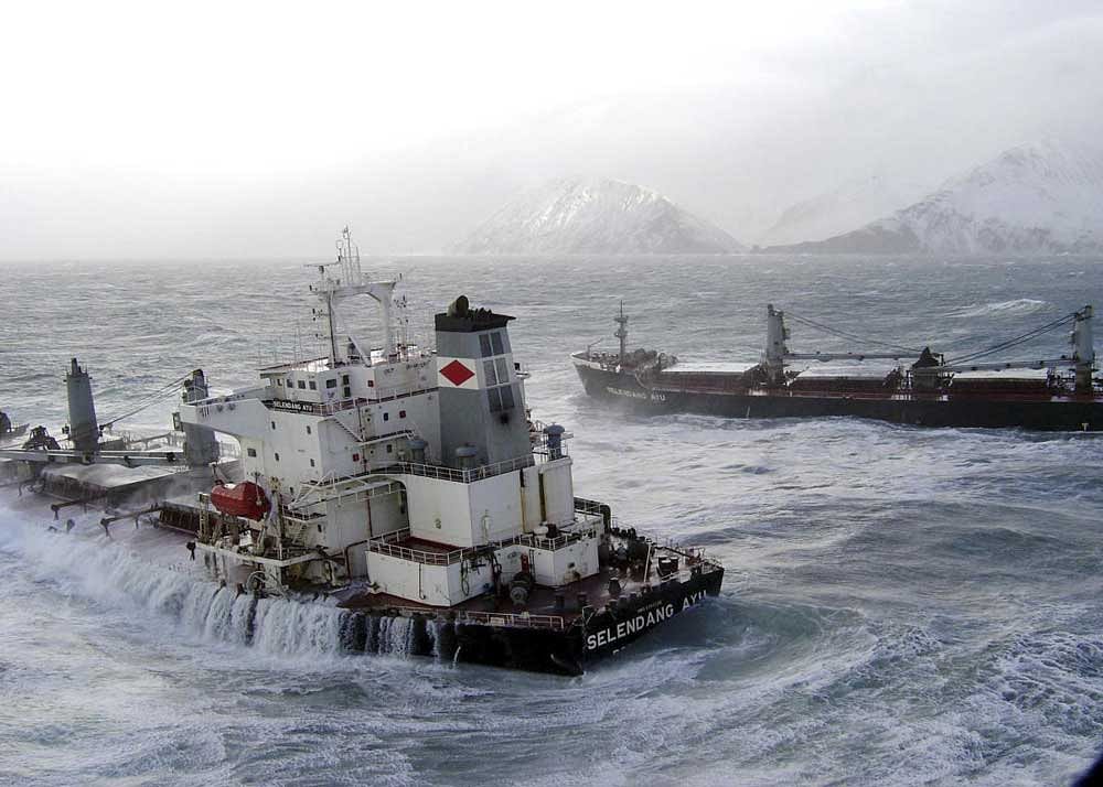 ICY DANGER: The 738-foot Malaysian cargo ship Selendang Ayu, split in two in high seas and gale-force winds, sits offshore of Skan Bay on Unalaska Island near Unalaska, Alaska. As global warming reduces the extent of sea ice in the Arctic, more ships will be plying waters farther north, which raises concerns about ship safety. NYT