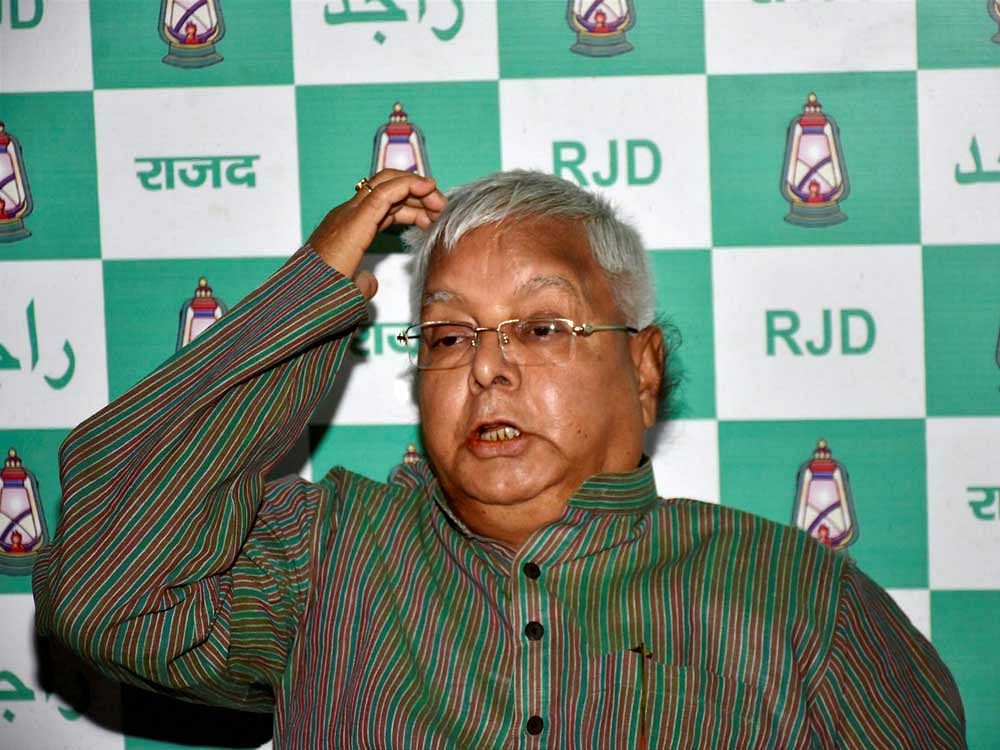 While the opportunites for taking power in Bihar are now replete thanks to Nitish's absence, Lalu has called for another Grand Alliance with his party with the aim to keep the BJP out of power. PTI file photo.