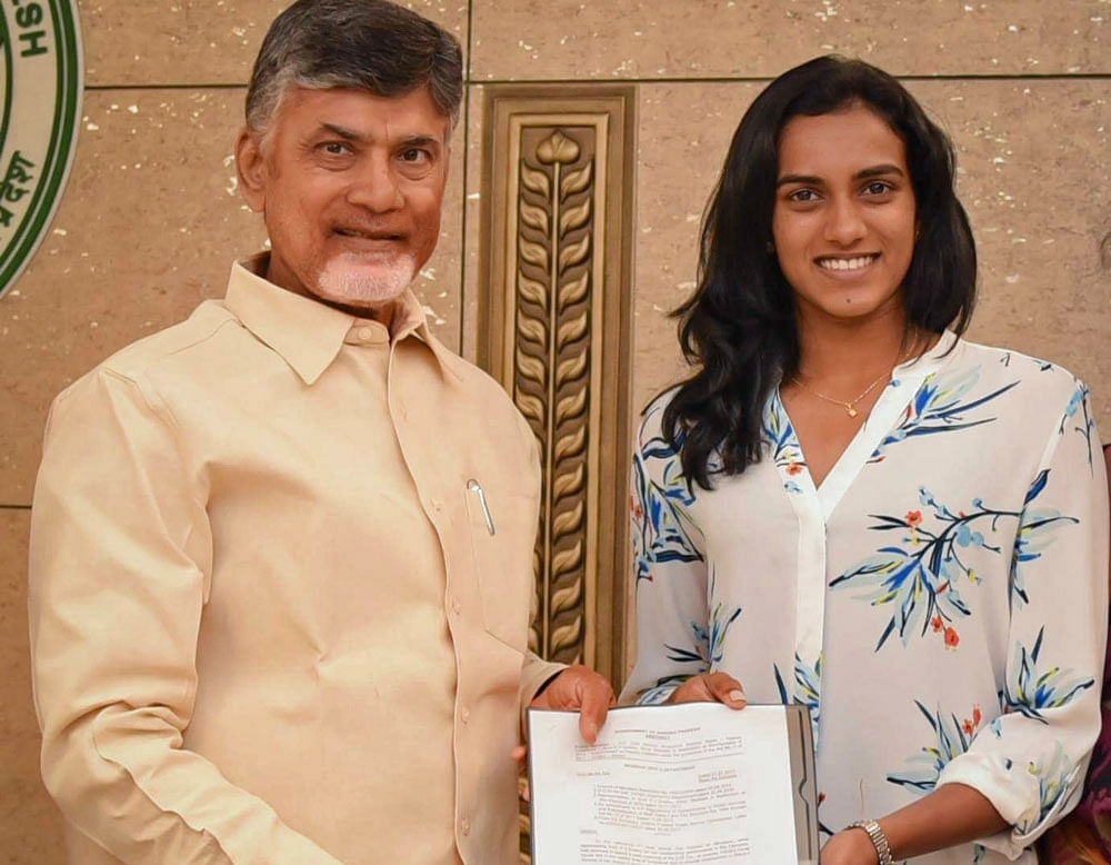 PV Sindhu receiving orders from AP Chief Minister Nara Chandrababu Naidu on Thursday.