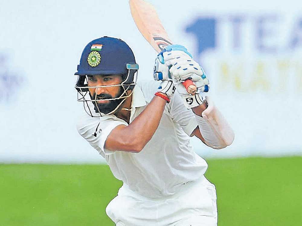 insatiable appetite India's highest run-getter in Tests last season, Cheteshwar Pujara continued from he had left off, scoring 153 in the opening Test at Galle. afp