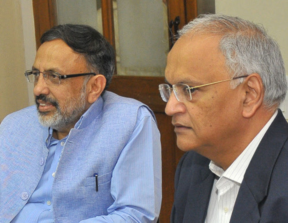 Rajiv Gauba (L), told a Parliamentary panel that the government has made no decision on making Aadhaar mandatory for flight bookings. file photo.