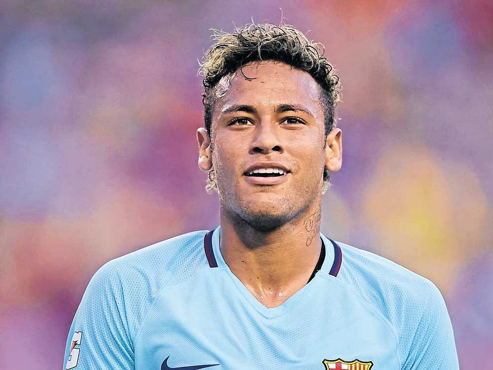 superstar: PSG feel securing Neymar will boost their profile in Europe. AFP