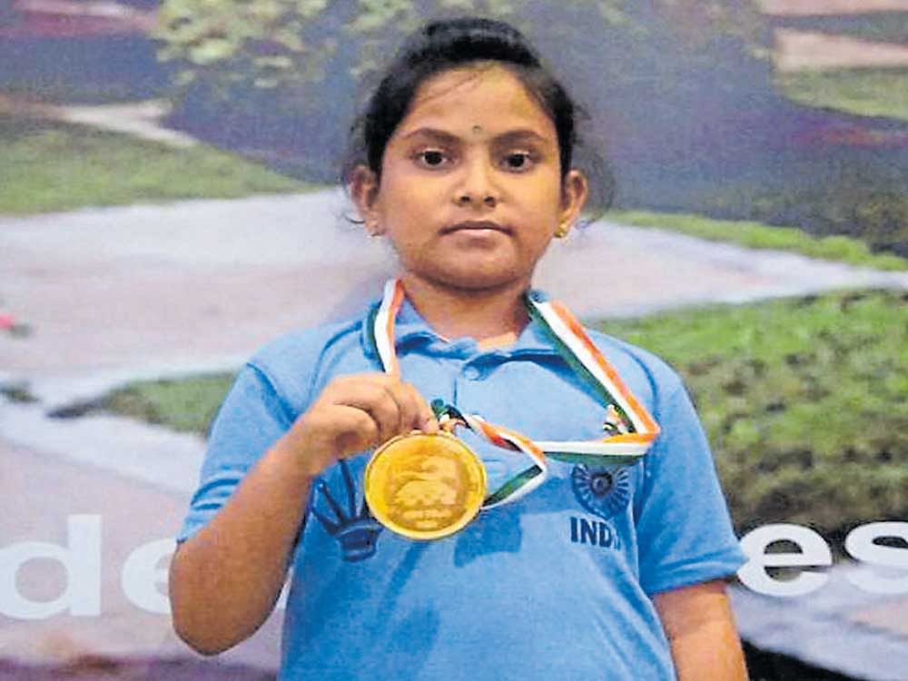 prodigy Karnataka's A N Shefali with the Commonwealth Chess Championship gold she won in New Delhi earlier this month.