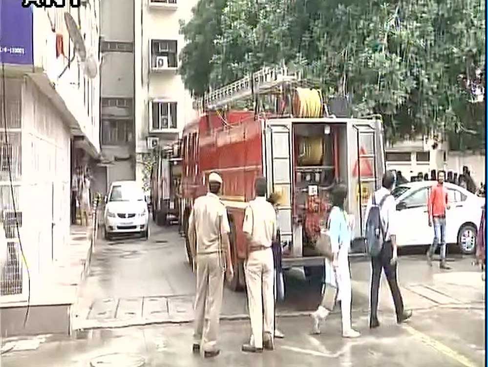 The fire, which broke out on the seventh floor, was doused within a few minutes and five fire tenders were rushed to the spot. Image courtesy: ANI