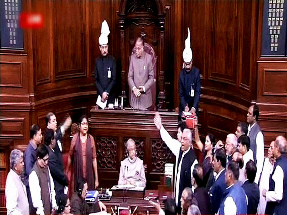 Congress members trooped in to the Well of the House raising anti-government slogans, which were matched by counter-sloganeering by the BJP benches. pti file photo