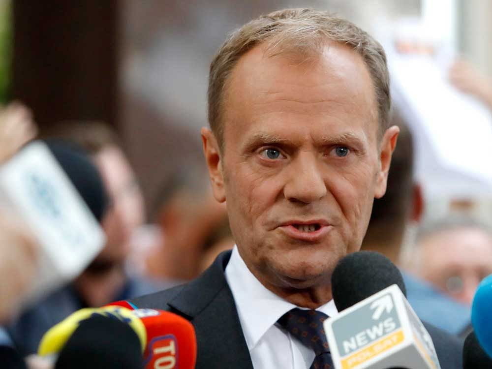 President of the European Council Tusk speaks to media next to the prosecutor's office in Warsaw. Reuters Photo