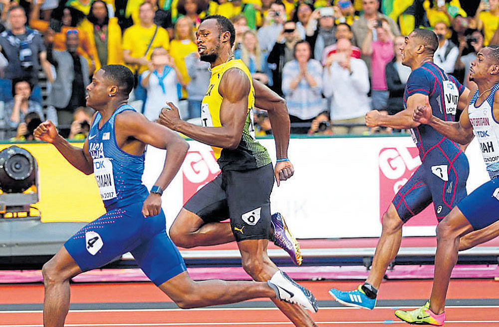 faster than lightning... American Christian Coleman (left) wins the semifinal ahead of Usain Bolt on Saturday. AFP