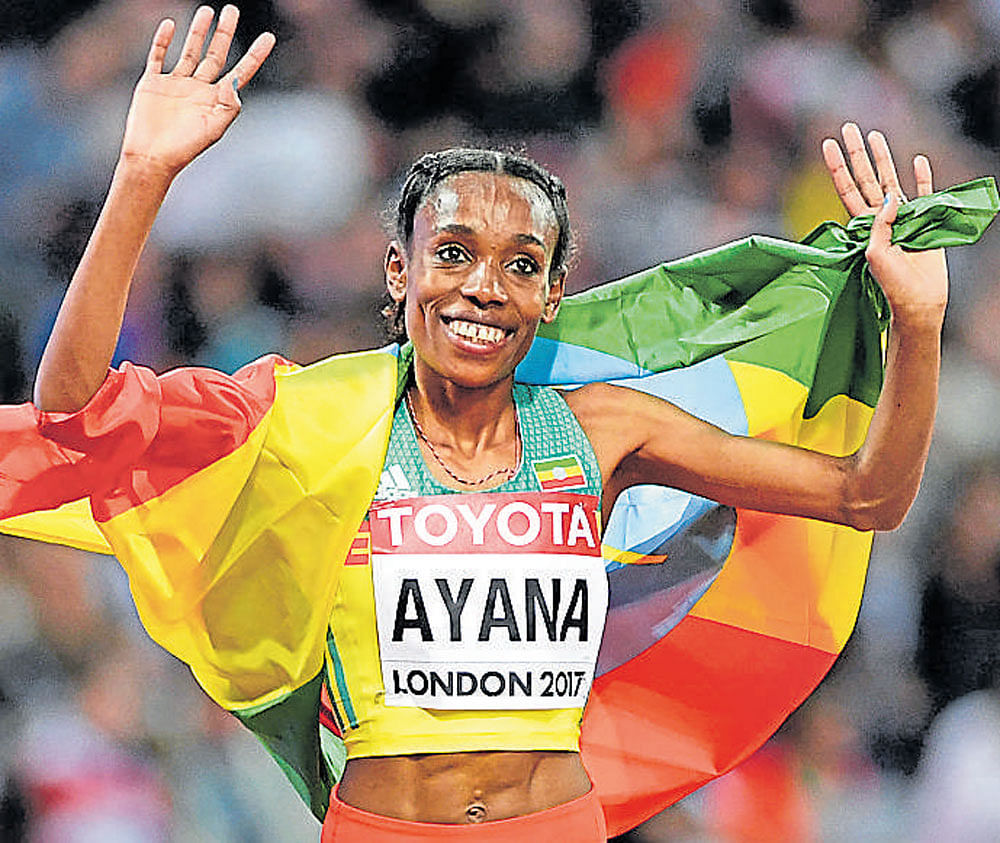 On Top Again: Almaz Ayana celebrates her triumph. AFP