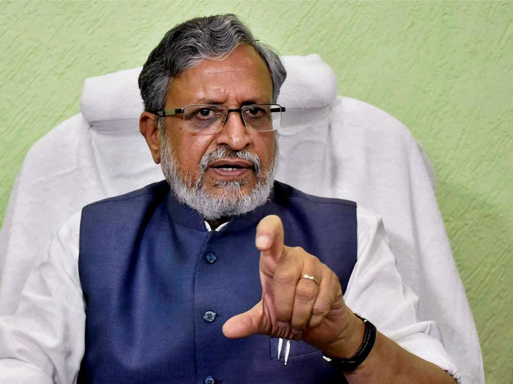 Bihar Deputy Chief Minister Sushil Kumar Modi said he would write to Income Tax and Registrar of Companies to probe sale and purchase of the three flats and take necessary action. PTI File Photo