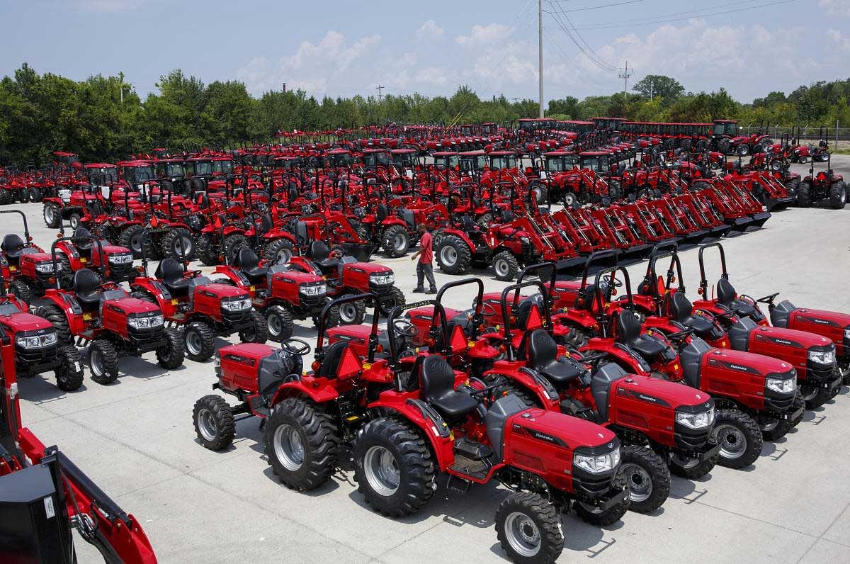 Driving fortunes: Tractors fill the lot at Southeast Mahindra, an assembly plant and distribution centre in Chattanooga, Tennessee. The region has become a magnet for investment from overseas, helping drive Tennessee's unemployment to a record low. New York Times