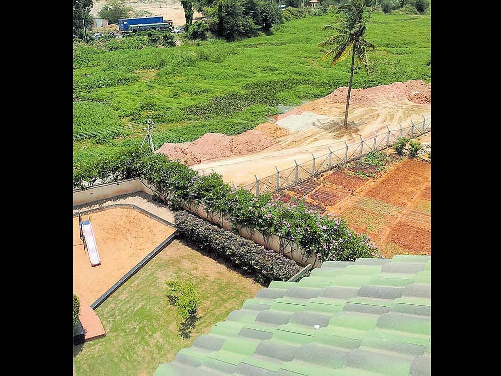 Residents fear that soil is being dumped illegally near  Varthur lake.