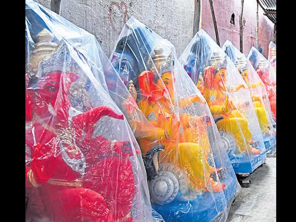 Ganesha idols made of PoP continue to be sold at one  of the stalls at VV Puram.