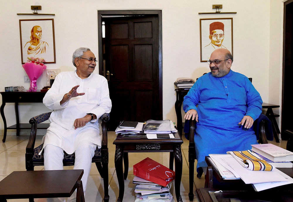 Bihar Chief Minister Nitish Kumar meets BJP President Amit Shah at the latter's residence. PTI.