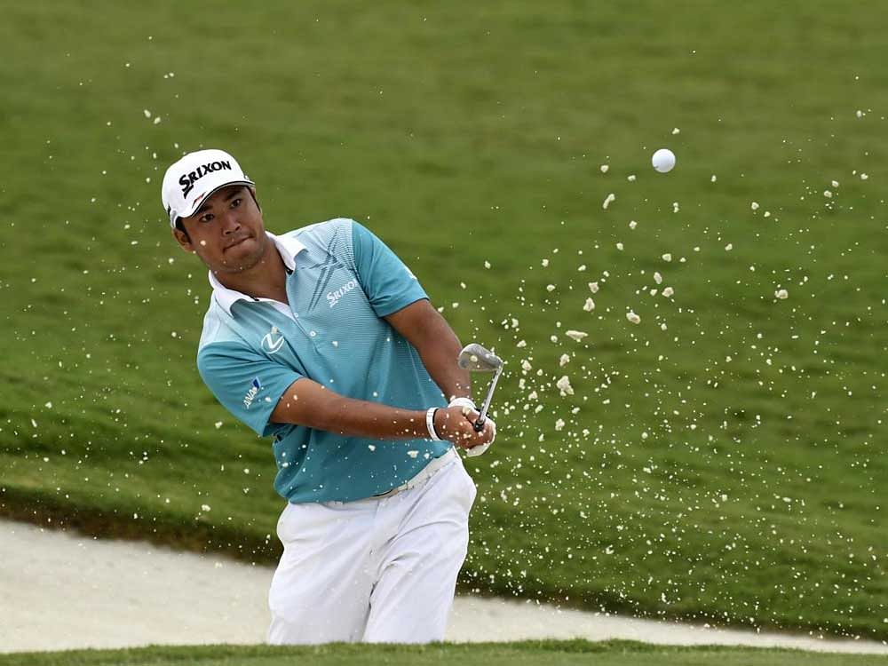 In control Hideki Matsuyama chips out of the bunker on the 16th hole during the second round on Friday. USA TODAY