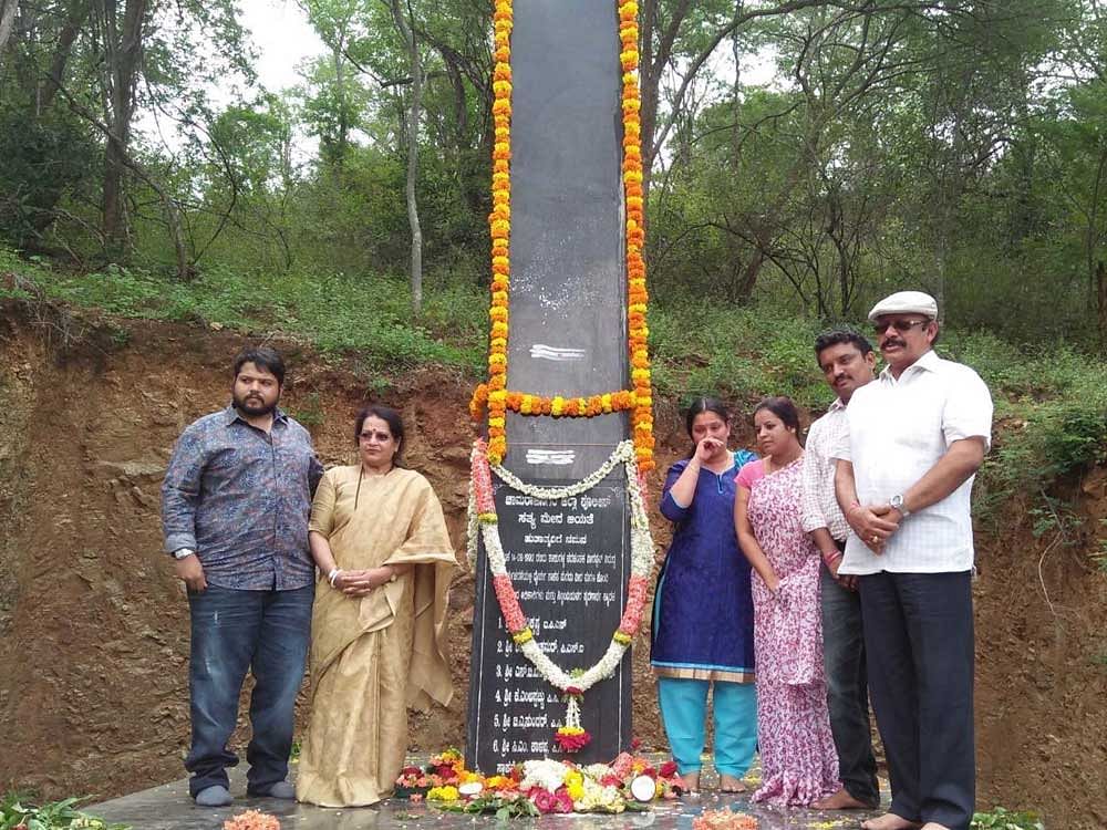 The family members of late T Harikrishna, and Shakeel Ahmed pay floral tributes to the memorial in Hanur, Chamarajanagar district, on Monday.