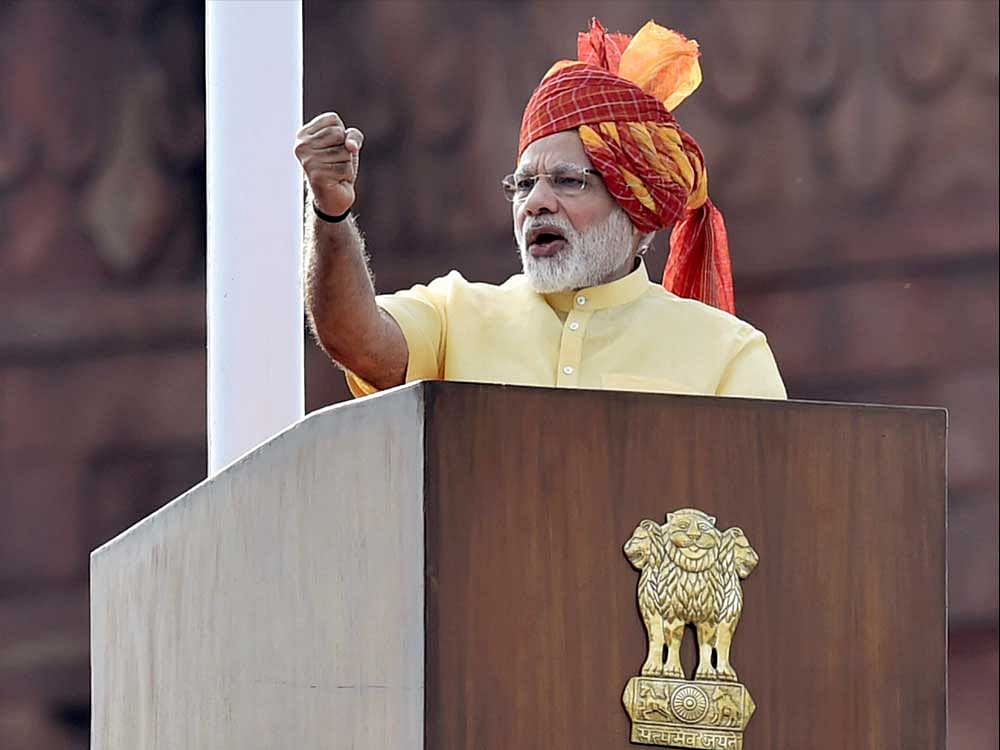 Prime Minister Narendra Modi addressing the nation during the 71st Independence Day function at the historic Red Fort in New Delhi on Tuesday. PTI Photo.