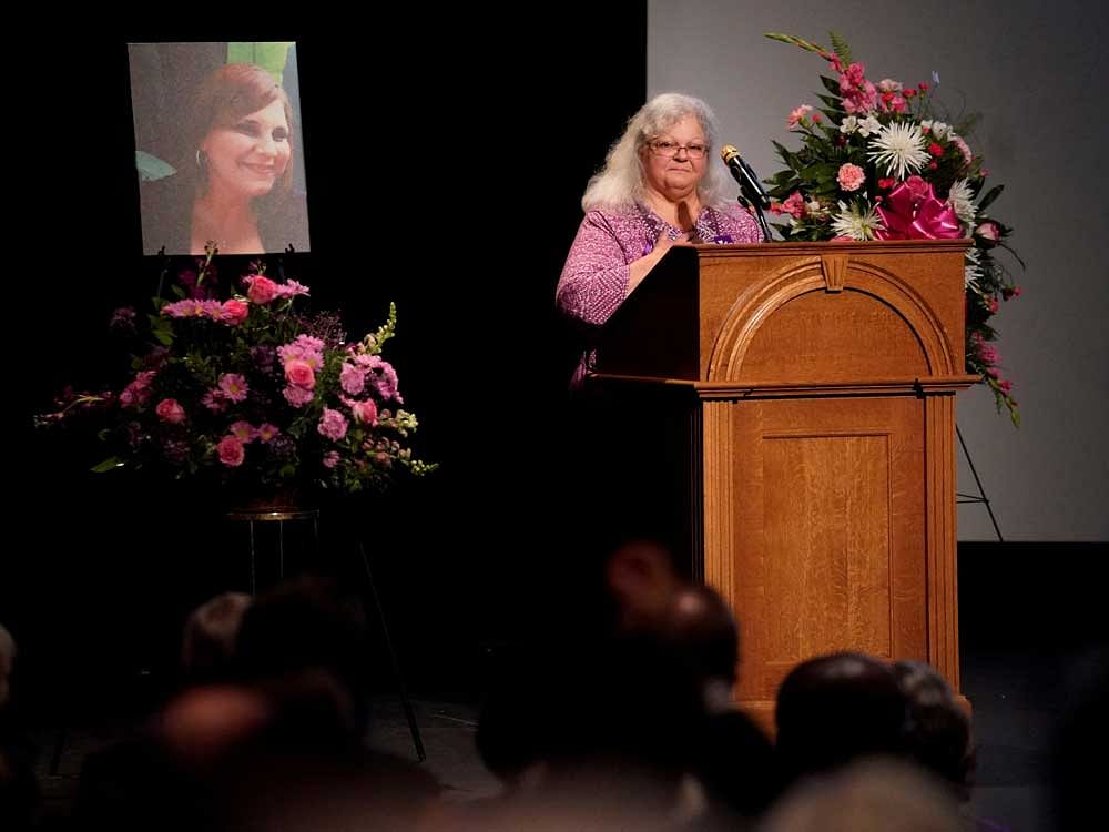 Racist attack victim Heather Heyer's mother Susan Bro receives a standing ovation during her remarks at a memorial service for her daughter at the Paramount Theater in Charlottesville, Virginia, U.S. August 16, 2017. REUTERS