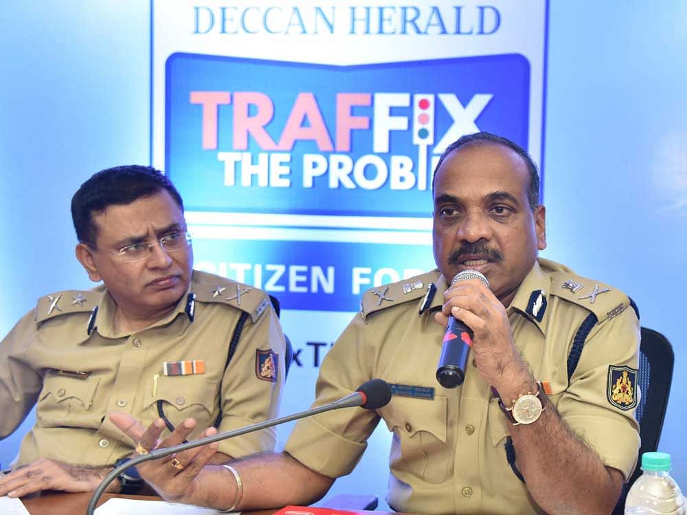 City Police Commissioner P Suneel Kumar and Additional Commissioner of Police Traffic R Hitendra at Traffix the Problem organised by Deccan Herald at the commissioner's office in Bengaluru on Saturday. DH Photo by B K Janardhan