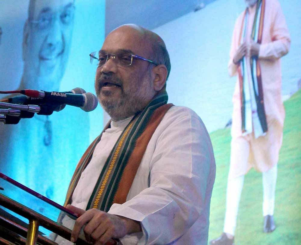 BJP national President Amit Shah addressing a gathering in Bhopal. PTI photo.