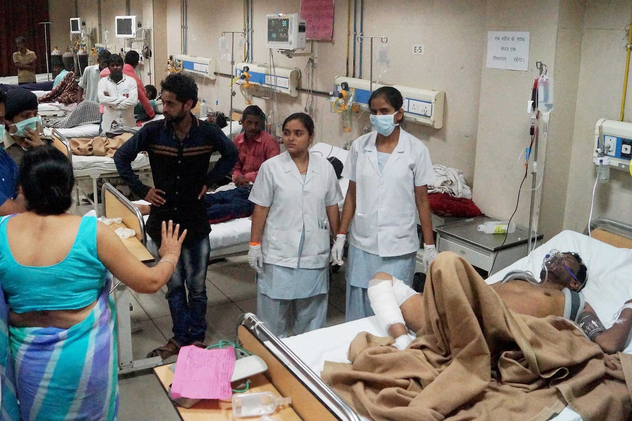 Injured people are being attended at a hospital in Meerut after the Puri-Haridwar Utkal Express derailed in Khatauli near Muzaffarnagar on Saturday. PTI Photo