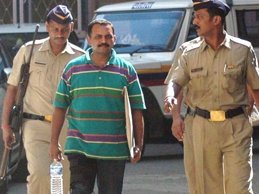 Shrikant Prasad Purohit expressed his happiness to newspersons as he was being escorted out of Taloja prison.